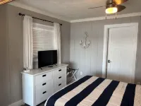 Experience Lake Life at Our 3-Bedroom Beachfront Cottage, Near Grand Rapids.