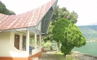 Tuk Tuk Timbul Bungalows