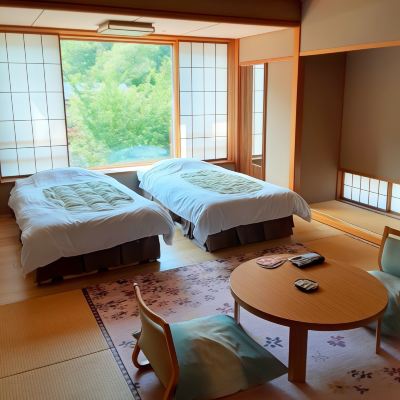 和洋折衷スタイルスタンダードマウンテンビュールーム 鶯宿温泉 長栄館の写真