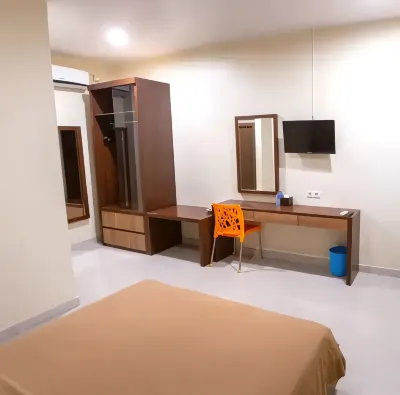 Rajawali Inn Hoteles cerca de Talise Beach