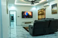 Charming 2-bedroom apartment with AC, WiFi along with security agent in Lome.