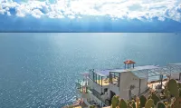 Zhenmei Holiday Hostel (Dali Erhai Cliff Lake View) Восточная часть живописной местности озера Эрхай: отели