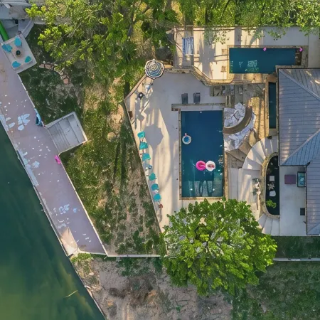 Waterfront Home- 2 Pools, Waterslide, huge boat dock and perfect layout!!