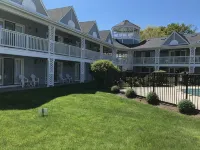 Relax and get away! Beautiful upscale condo with pool near OGT Village and Beach