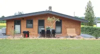 Quietly located modern vacation accommodation with a view of the Edersee National Park - Homestays