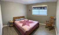 Spacious 4 bedroom cottage near Current River - Wi-Fi