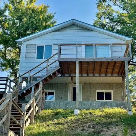Cottage right on the AuSable River in charming Mio