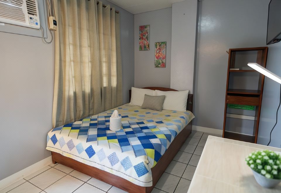 Mellow Apartelle and Tourist Inn - Housity