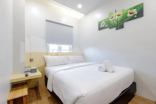Travel Biz Hotel Medan Mitra RedDoorz Hôtels à : Medan Area