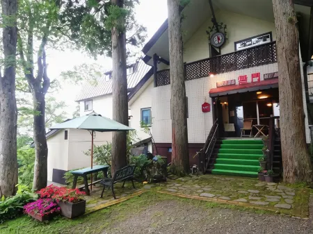 Hotel Mumon Отели в г. Мёко