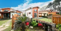 Seogwipo Jeju Woori House Pension - Bungalows