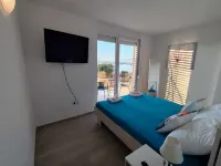 Quiet 79m2 Apartment by the Sea with Garden and Communal Pool - 民宿