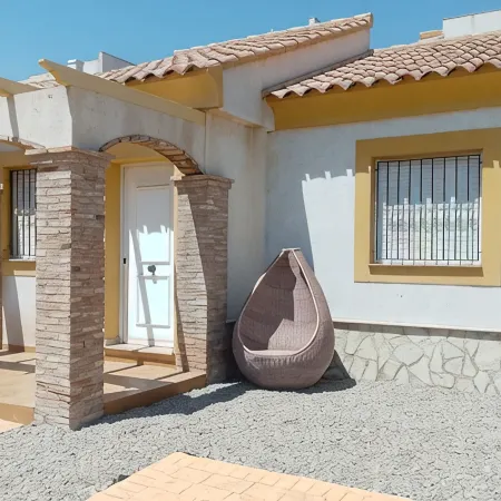 Detached Villa with Communal Pool Close to beaches and Golf Course.