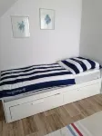 Cozy Vacation Apartment with Bicycle Garage Just 6 km from the Beach
