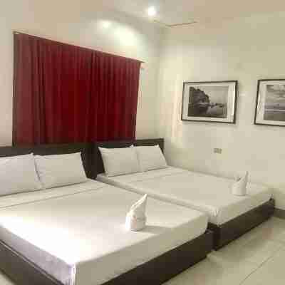 Paguia’s Cottages Rooms