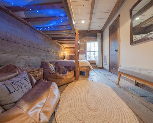 Steps to Elk River! Cozy Cabin w/ Hot Tub & Bunk Room Hotels in Avery County