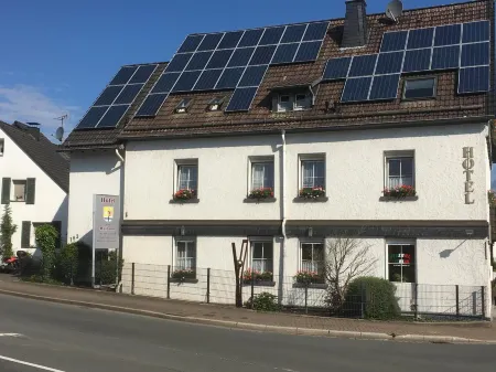 Hotel am Maibaum Отели в г. Меркиш