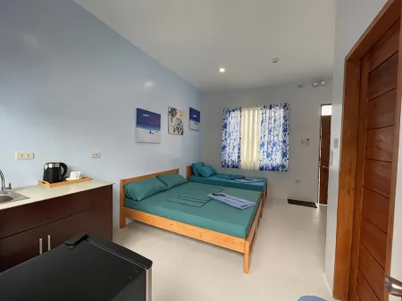 Blue Summer Suites & Restaurant Отели рядом с достопримечательностью «Пещера Хинагданан»