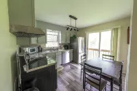 Relax with the family in a newly renovated and furnished upper level duplex. - 2-Star