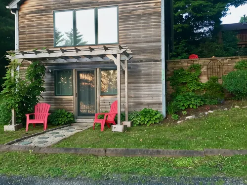 Beautifully appointed lake-view cottage with dock access