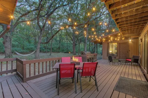 Spacious A-Frame sleeps 25 on 5 wooded acres with a private fishing pond