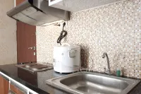 Cozy 2BR Tamansari Panoramic Apartment By Travelio