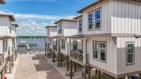 Quiet WHOLE HOUSE btwn the beach and Lagoon with pool, fishing dock, sunsets!! - Country Houses