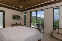 Walk to world famous Maho Bay! Privacy, views, pool, 4 equal king size bedrooms.
