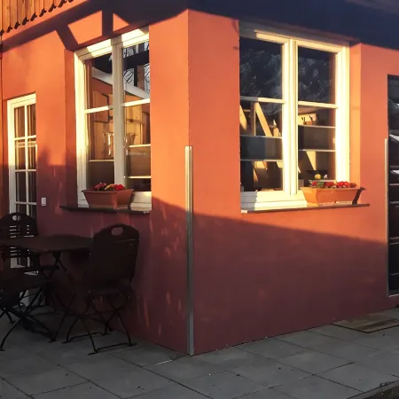 Sunny holiday home with a cozy sleeping loft, idyllically located in the garden.