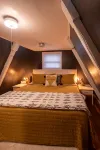 Cozy 2-bedroom Aframe in charming Lake Geneva with a hot tub and fireplace - Wifi