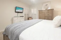 JulySpecials~DolphinViews~900FtPvtBeach~HeatedPool~CoveredParking~CouplesGetaway - بوتيك