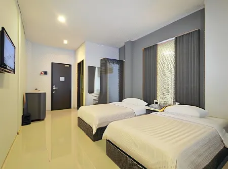 Studio Inn & Suites Semarang Отели в г. Gajahmungkur