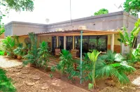 Umoja Guest House Hotels near ACT Ouaga