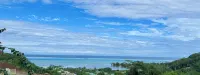 Bungalow with magnificent lagoon and mountain views, in a natural setting