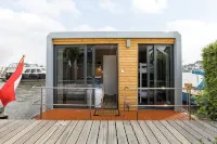 Houseboat Skoft with beautiful view over the water and on village Grou.