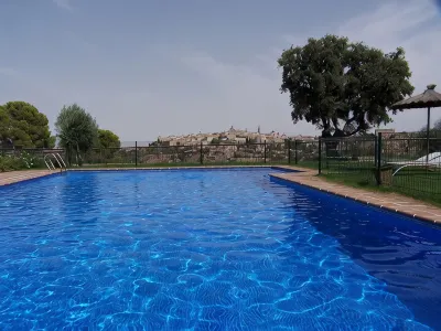 HOTEL CIGARRAL EL BOSQUE Hoteles en 