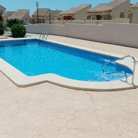 Detached Villa with Communal Pool Close to beaches and Golf Course.
