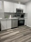Guest Suite in Regina - Queen Bed - บังกะโล