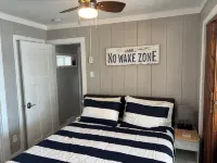 Experience Lake Life at Our 3-Bedroom Beachfront Cottage, Near Grand Rapids.