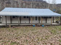 Charming 3-bedroom riverside cabin close to Grand Teton and Yellowstone - Alphydda