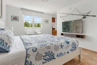 Charming Beachfront Retreat - Wake Up to Waves - 2 BD Apt with AC at Río Grande - 3-Star