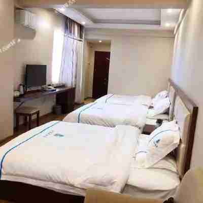 墨江華庭大酒店 Rooms