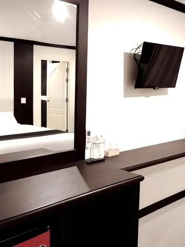 รูปภาพของเดอะ แคปิตอล โฮเต็ล