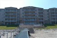 Lakefront condo --2BR/2Bath Sleeps 4  Private beach and lake front balcony