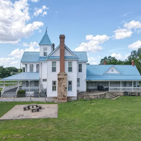 Spacious 4-Bedroom Historical Home w/modern comforts in Old Town McAlester, OK.