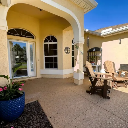 Great location..Climate-controlled lanai & NEW 2024 4-SEATER GOLF CART INCLUDED!