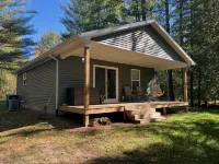 Charming 2-Bedroom Cabin on the River in Beaverton - 3-Star
