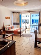 Cowrie Shell Beach Apartments Official