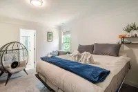 Luxurious 5-bedroom house with swim-spa, fitness&weight room, game room, & more!