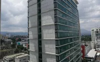 Prime and Comfy Studio at Tamansari la Grande Apartment by Travelio
